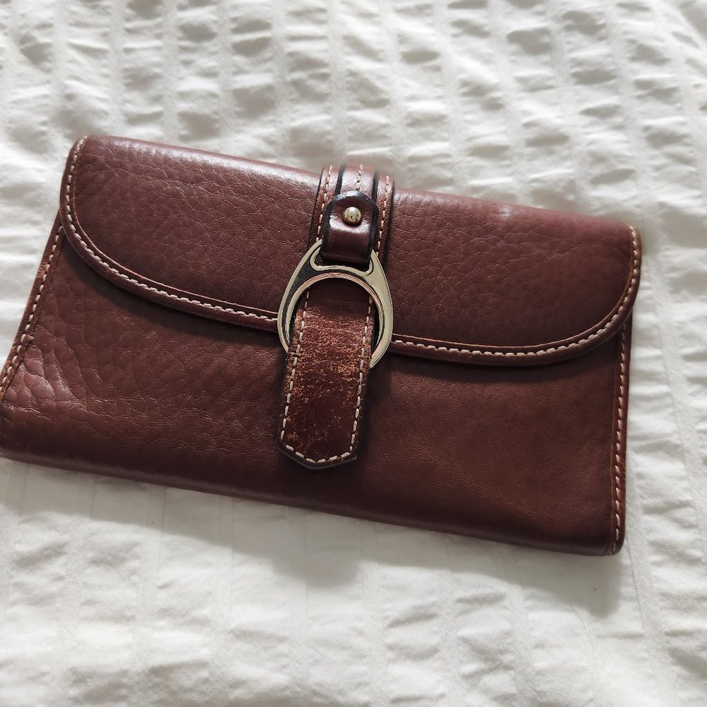 All leather good condition Dooney & Bourke snap wallet.